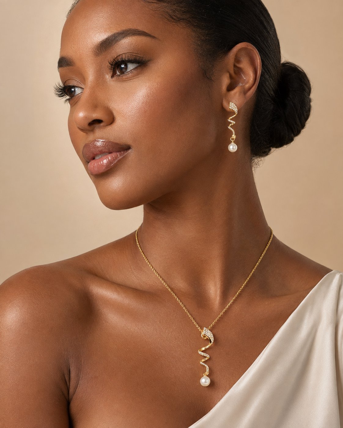 Aurelia necklace and earrings worn, close crop on neck and ear