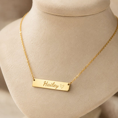Custom Name Bar Necklace engraved on a display bust